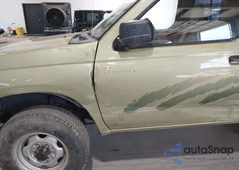 1998 Nissan Frontier Xe z USA, uszkodzony, nr VIN 1N6DD21Y6WC338111